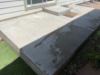 Back patio was sinking due to poor compaction and water intrusion, causing a large tripping hazard. Raised the concrete to its corrected height/slope, and removed tripping hazard.