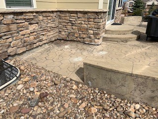 Sunken back patio causing water intrusion into basement