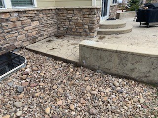 Sunken back patio causing water intrusion into basement